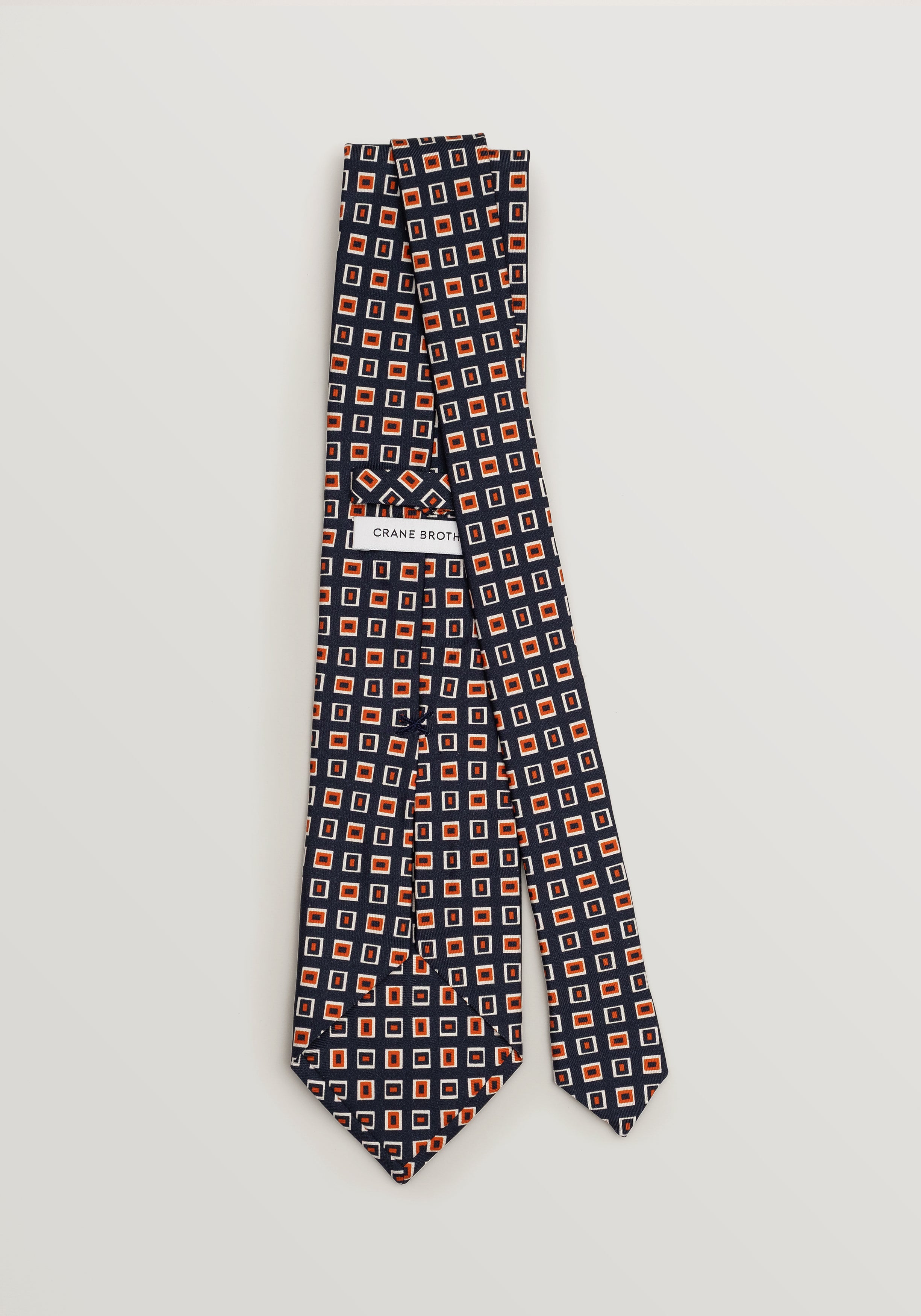Lioni Abstract Printed Silk Tie - Navy and Orange